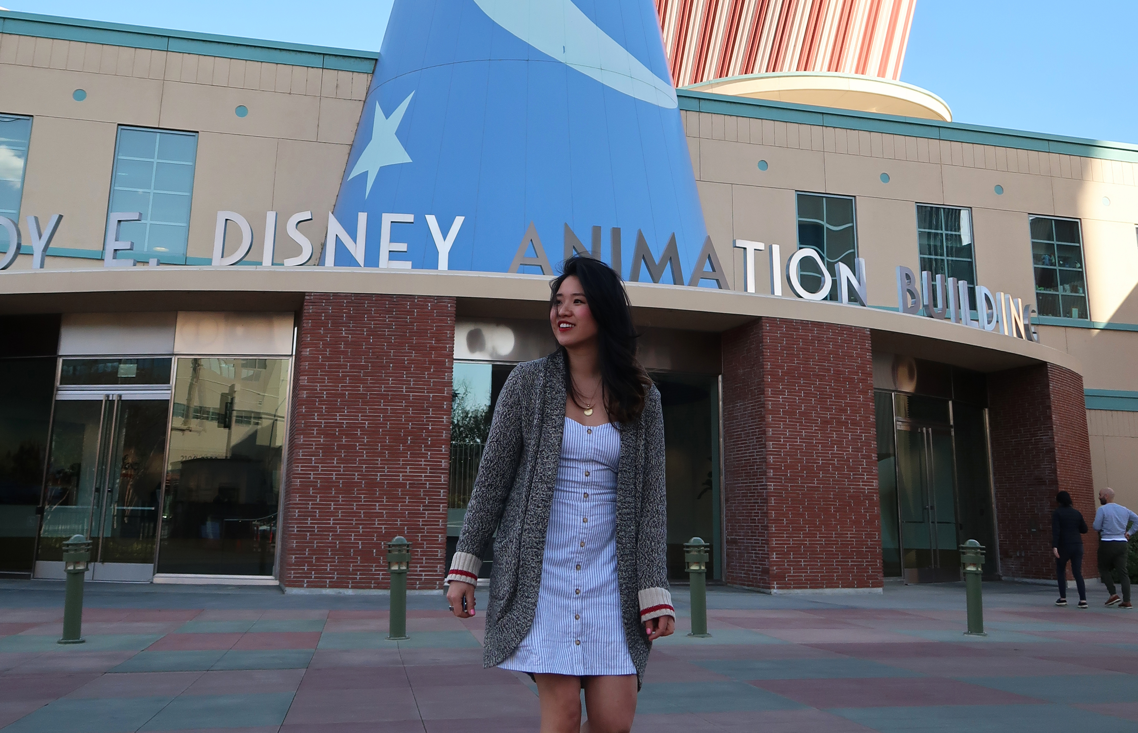 Woman standing in front of Disney Animation Studios