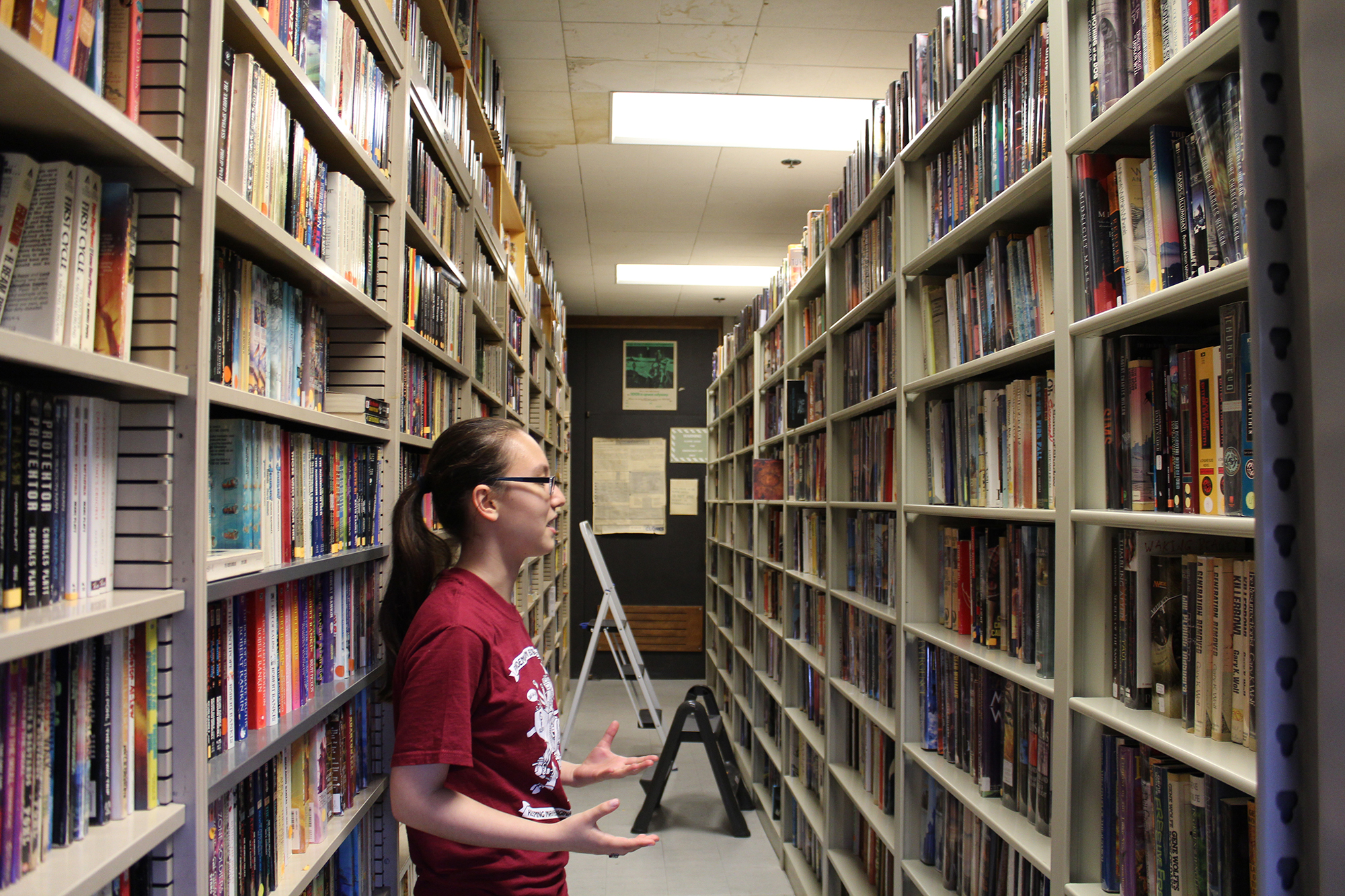 Cathleen Nalezyty ‘16 browses the MITSFS library.