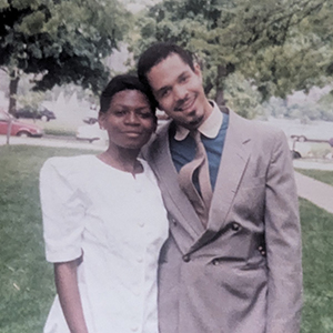 A photo of Crystal Dixon and Michael Dixon standing outside