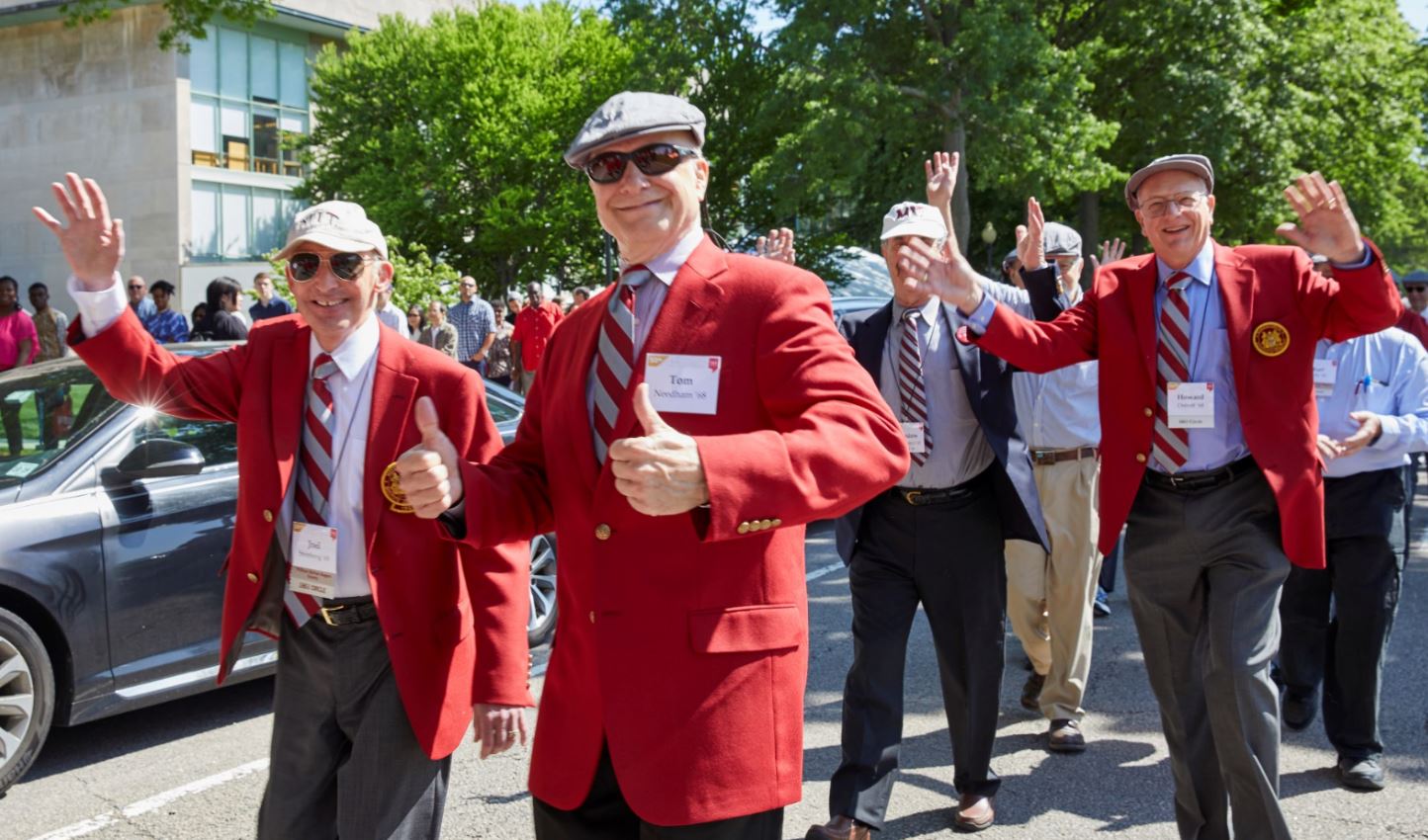 MIT alumni from the Class of 1969 march with their red jackets during Tech Reunions.