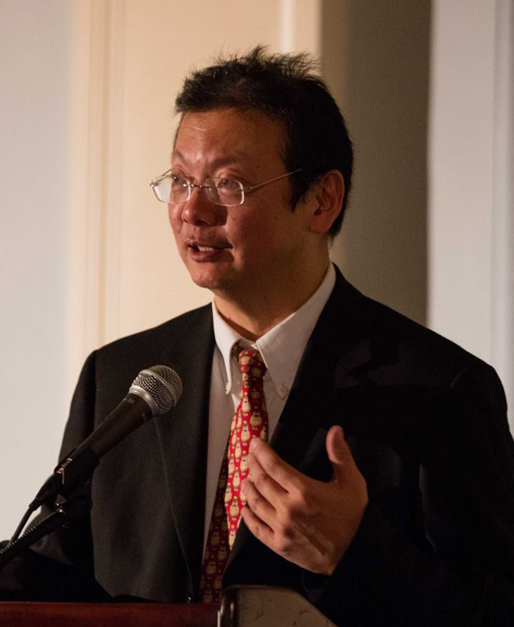 Andy Chiang speaking at a podium