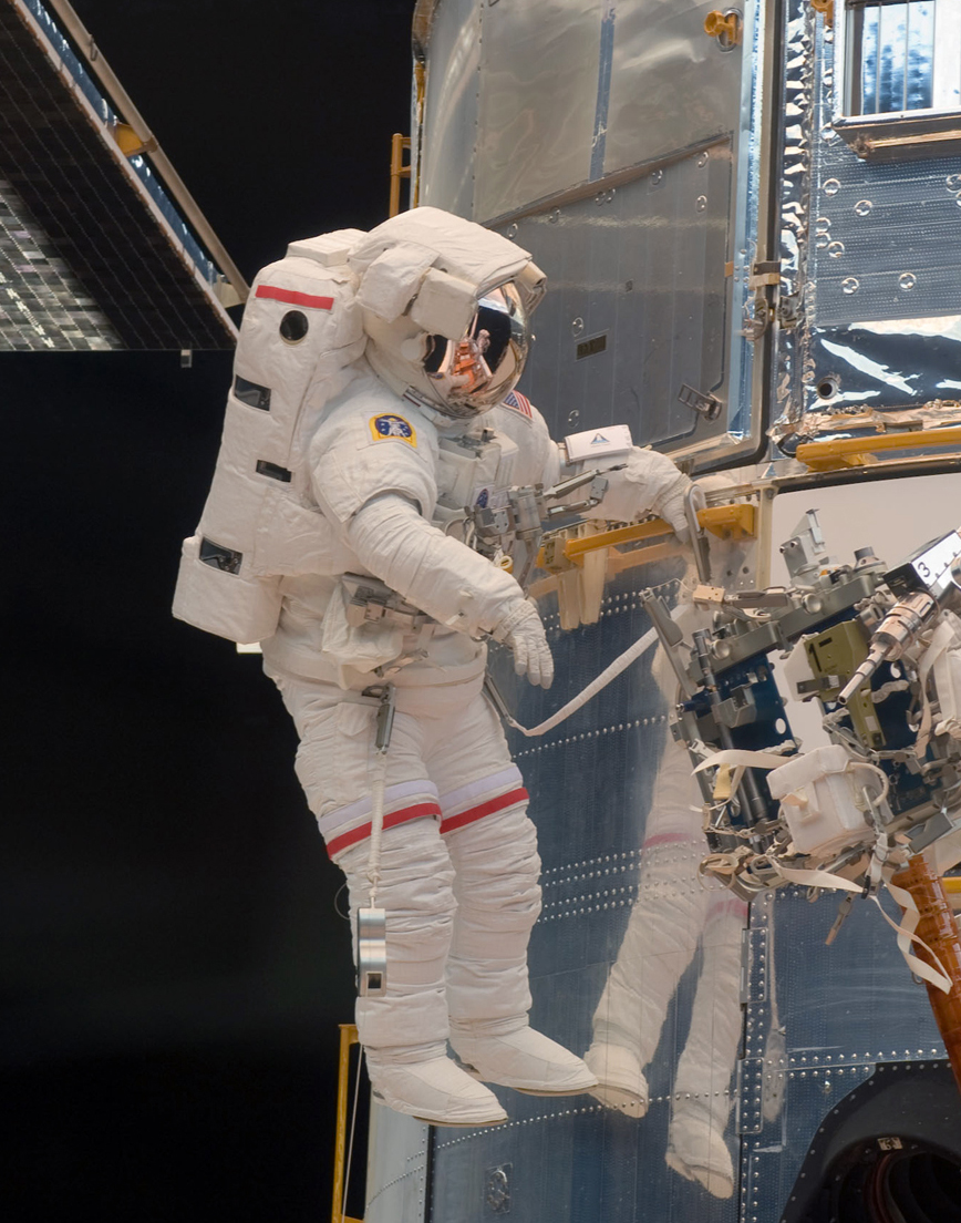 Grunsfeld works on Hubble repairs. Photo: NASA