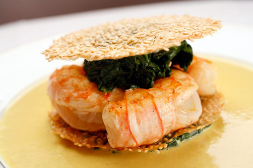 Feuillantine de queues de langoustines aux graines de sésame, sauce curry, created by Chef Bernard Pacaud at L'Ambroisie, a Michelin three-star restaurant, Place des Vosges, Paris. (© Owen Franken)