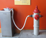 Fire hydrant connected to a drinking fountain