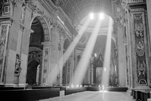 Sunbeams inside St. Peter's Basilica, Vatican City (© Owen Franken).