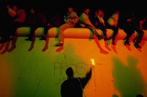 Revelers atop the Berlin Wall