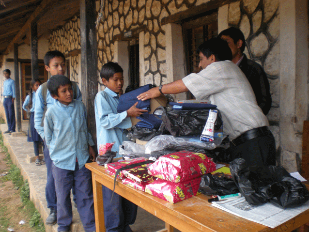 Volunteers distribute educational materials.