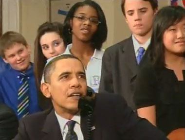 The President and students talk to astronauts.