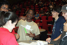 Contestants work a physics problem at the 2008 challenge