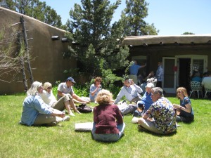 Conversations continue during a picnic at a Santa Fe house where Manhattan Project phycists gathered to relax.