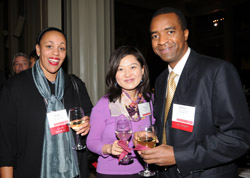 From left: Club of North Florida President Paki Taylor SM '01; Ying Cao '01, MNG '02; and Martin Mbaya '00, who received the Harold E. Lobdell '17 Distinguished Service Award for his alumni relations volunteer work. Photo: Darren McCollester.