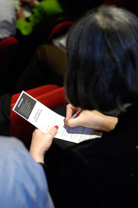 After the MIT150 presentation, attendees filled out commitment cards indicating how they would get involved in the historic event. Many will be planning local get-togethers and service projects. Check the alumni section of the MIT150 website for info as it becomes available: http://mit150.mit.edu/alumni. Photo: Tanit Sakakini.