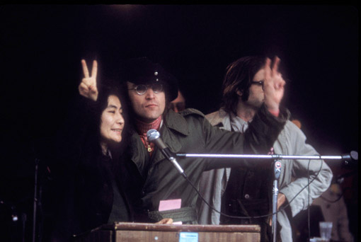 John Lennon and Yoko Ono at an antiwar rally in New York, early 1970s.