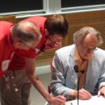 Professor Walter Lewin and the referees tally the results.