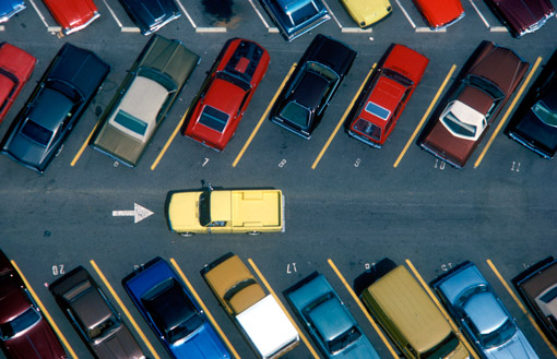 Cars in a parking lot (© Owen Franken).