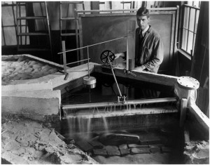 John Drisko '27 "operating a dam which faithfully reproduces the rise and fall of the tides of the Atlantic Ocean in a 41-foot scale model of the Cape Cod Canal” published in the Boston Herald in 1933. Photos courtesy of the MIT Museum. 