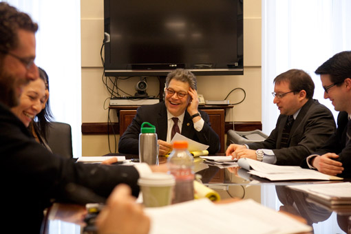 Al Franken presides over a staff meeting (© Owen Franken).