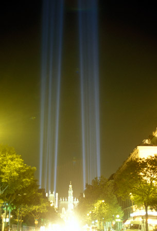 Two search lights at the Hotel de Ville (City hall) in Paris, Sept. 11, 2002, commemorating the World Trade Center towers (© Owen Franken).