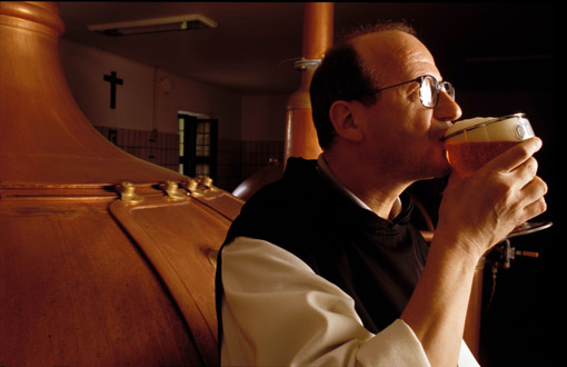 Brother Lode, a Trappist Monk, enjoys a beer at the Orval Brewery in Belgium (© Owen Franken).