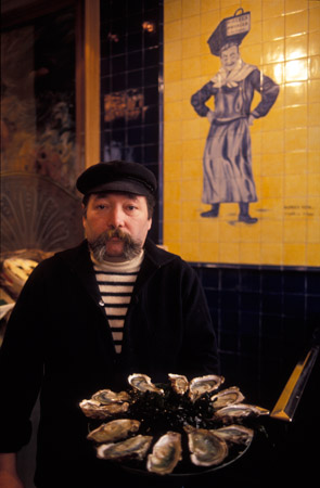 Oysterman in a Paris seafood restaurant 