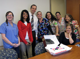 Priyanka, Dr. Jacobowitz, and staff members at Hudson Valley Ear, Nose, & Throat, who surprised  Priyanka with a cake on her last day.