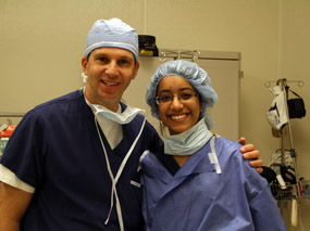 Dr. Jacobowitz and Priyanka dressed for surgery in the OR.