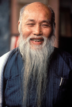 Laughing man, China (© Owen Franken).