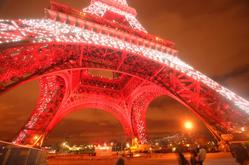 The Eiffel Tower lit with red for the visit of the Chinese President Hu Jintao, February 2004 (© Owen Franken).