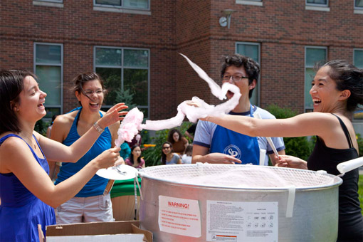 MIT students make cotton candy at SP's 10th Anniversary Brunch & Carnival. From left: Michelle Sander PhD '12, and grad students Christin Sander, Chen Lu, and Jennifer Jarvis. Photo: Dani De Steven for the Office of the Dean of Student Life.