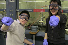 From left: Students Dan and Hansol have a little fun in the lab during one episode.