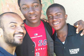 Filmmaker Arthur Musah ’04, MNG ’05 (far left) in Kano, Nigeria, August 20, 2012.