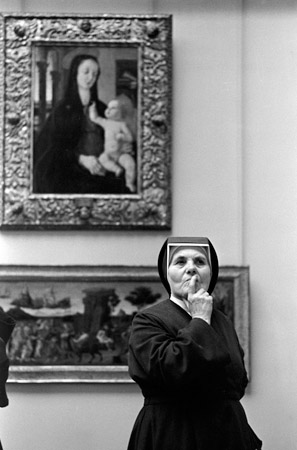 Nun contemplating art (© Owen Franken).
