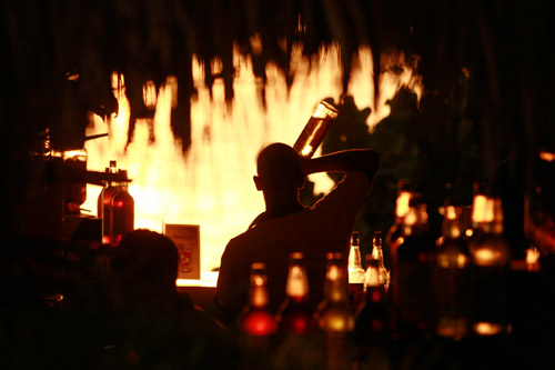 Cocktails at Marina Beach Hotel, Sosua Beach, Dominican Republic (© Owen Franken).