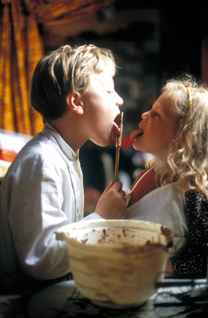 Franken's children, Tunui (left) and Manui, in earlier days licking chocolate