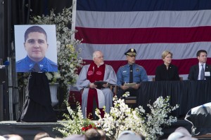 Chief DiFava, second from left, at the memorial for Officer Collier. Photo: Dominick Reuter.