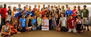 First generation students in the peer mentorship program, holding a poster of MIT’s president, L.Rafael Reif, who is also the first gen in his family to graduate from college.