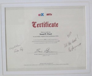 Patel's 6.002x certificate, signed by Professor Agarwal and President Reif.