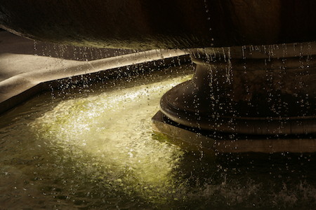 Dripping water at a fountain in Rome (© Owen Franken).