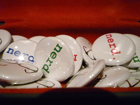 Pins passed out at Nerd Nite. Photo: Mary Lewey