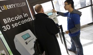 Chris Yim '07 at one of his Bitcoin ATMs. Photo: Dominick Reuter/Reuters.