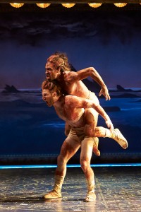 Zach Eisenstat, bottom, and dancer Manelich Minniefee united as Caliban in an ART performance of The Tempest.