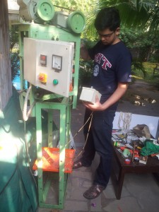 Sid Pai '14 harvests plastic into 3D printer filament with his ReFilBot.