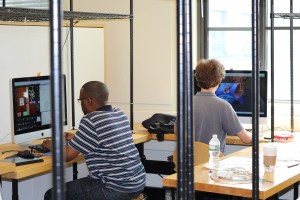 MIT students work on their video games.