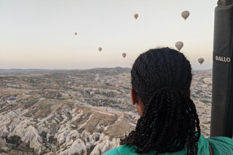 Smith-Dell takes in the view of the mountains of Cappadocia in Turkey from a hot air balloon.