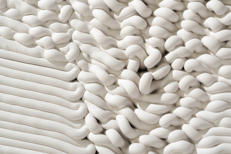 White clay extruded into long strips