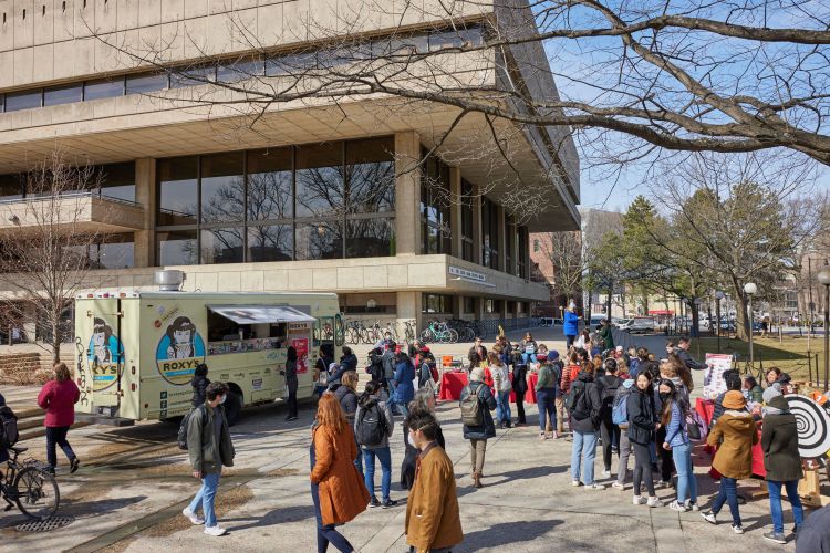 Students enjoy games, prizes, and fare from Roxy’s Grilled Cheese & Burgers at the Pi-Day Observed event, held on campus during the MIT 24-Hour Challenge