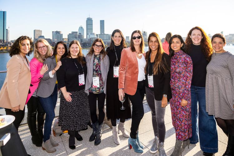 Photo of nine MIT Alumnae with Boston backdrop