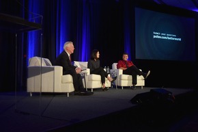 Three people in a panel discussion 