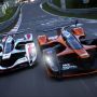 Game image of two racecars side by side. They are seen from the front with track behind them.