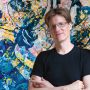 A portrait of Blake Brasher ’03 is silhouetted over an image of one of his artworks.